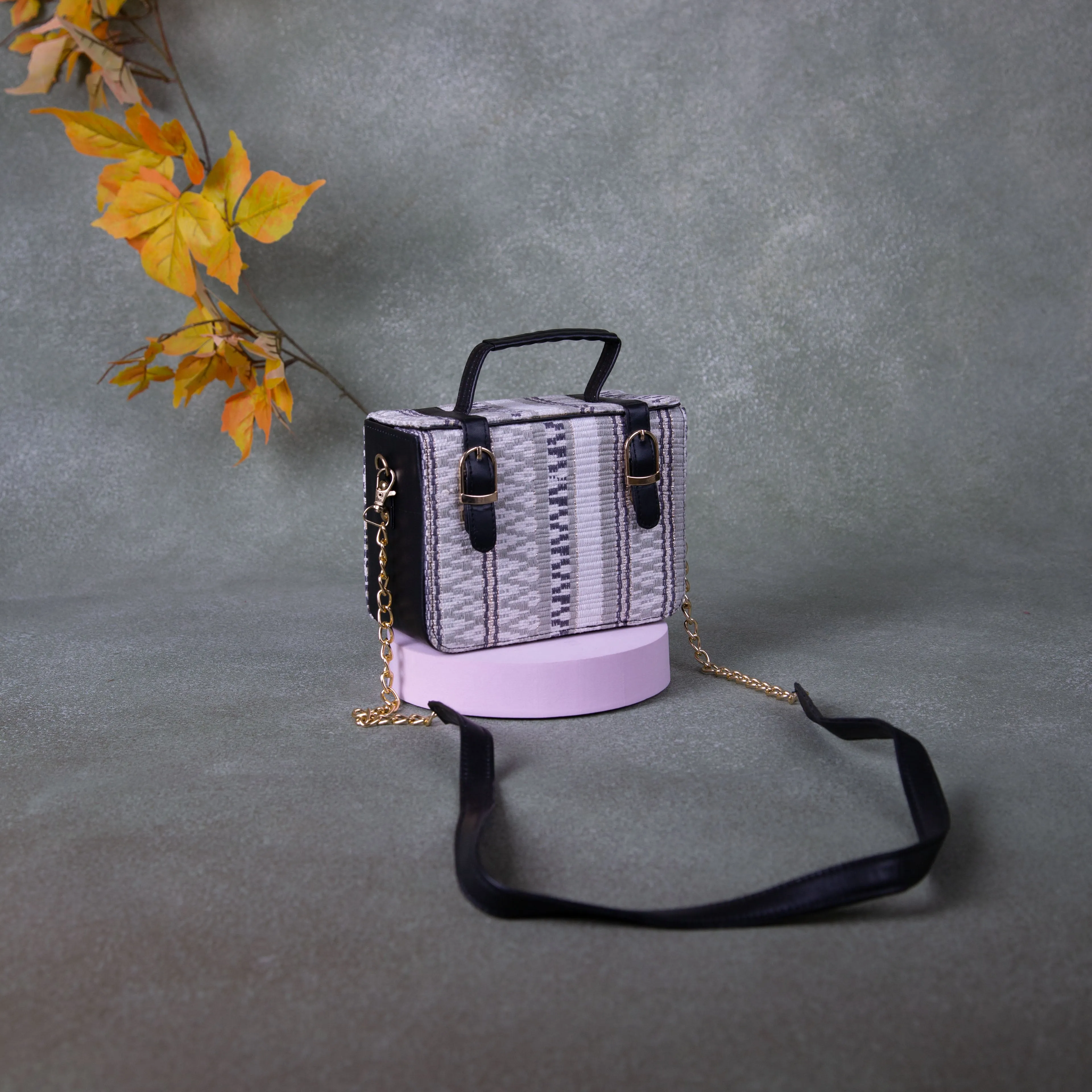 Cuboid Case Sling bags White with Black Colour Zig Zag Design.